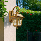 Vintage Bronze Lantern Wall Sconce with Curved Arm